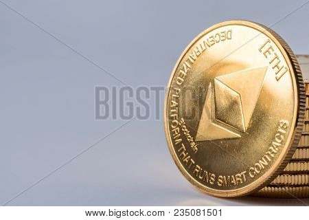 Golden Bitcoin Coins On A Dark Background With Euro Coins. Virtual Currency. Crypto Currency. New Vi