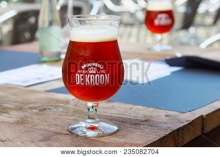 Neerijse, Belgium - September 05, 2014: Tasting Original Beer Of The De Kroon Brand In Same Name Res