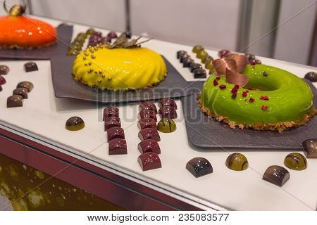 Variety Of Chocolate Products On The Counter. Food