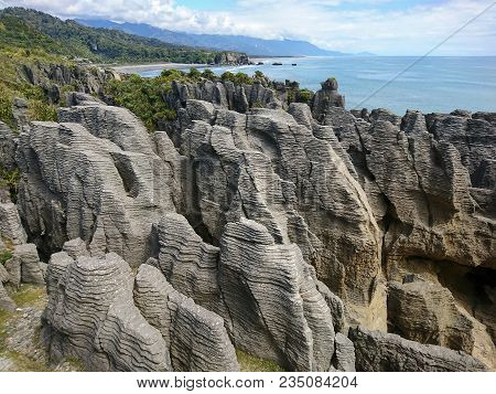 Pancake Rock Over Seacoast Skyline, New Zealand Weast Coast Natural Landscape