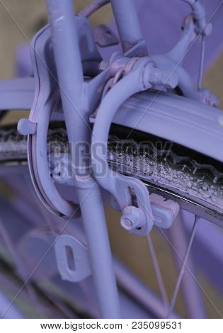 Brakes Of The Purple Bike With Padlock Antitheft
