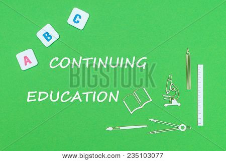Concept School, Text Continuing Education, School Supplies Wooden Minitures, Abc Letters On Green Ba