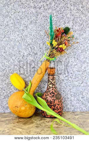 Still Life From A Bouquet Of Dry Flowers, Lagenariya, A Jug And A Yellow Tulip.