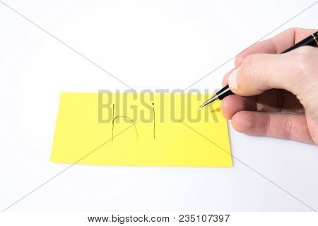 Hi Handwrite With A Hand And A Pen On A Yellow Paper Composition