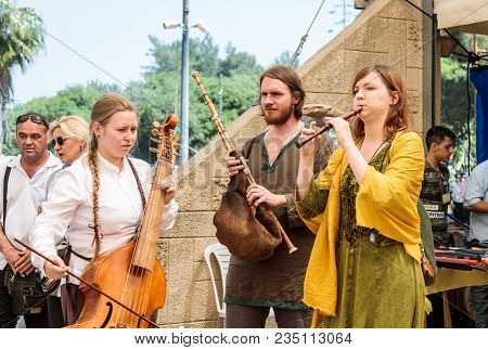 Goren, Israel, April 06, 2018 : Musicians Play Musical Instruments For Guests Of Knight Festival In 