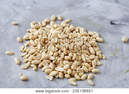 Pile Of Peelled Peanuts Isolated On White Textured Background, Background, Top View, Close-up, Selec