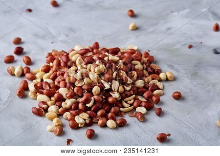 Pile Of Mixed Raw Peelled Peanuts Isolated On White Textured Background, Background, Top View, Close