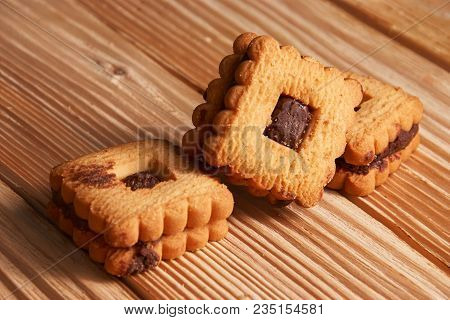 Chocolate Cookies On Gray Plate On Wooden Table