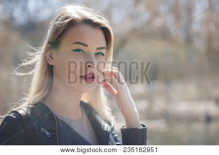 Outdoors Portrait Of Beautiful Young Brunette Girl. Woman Smiling Happy On Sunny Summer Or Spring Da