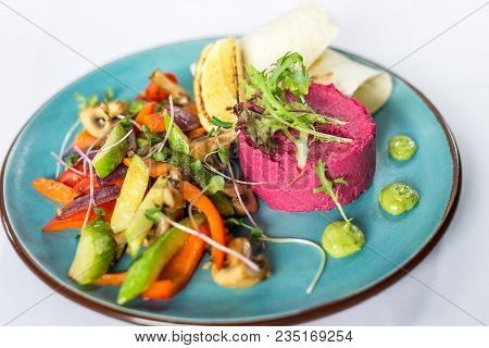 Vegetable Vegetarian Salad In A Blue Plate