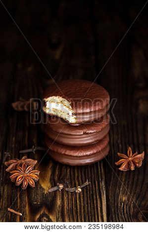 Three Choco Pie Sweet Dessert On The Village Dark Old Table In Moodle Style
