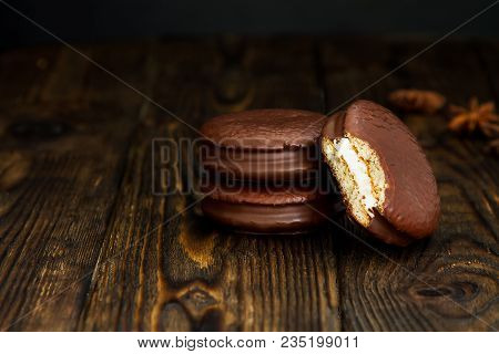 Three Choco Pie Sweet Dessert On The Village Dark Old Table In Moodle Style