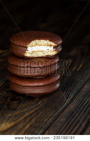 Three Choco Pie Sweet Dessert On The Village Dark Old Table In Moodle Style