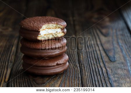 Three Choco Pie Sweet Dessert On The Village Dark Old Table In Moodle Style