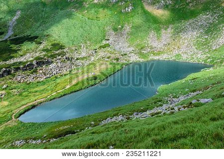 The Blue Lake Brebeneskul Among Carpathians Mountains