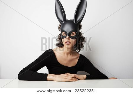 Sexy Beautiful, Young Woman Posing In Lace Lingerie And Black Bunny Mask On White Background