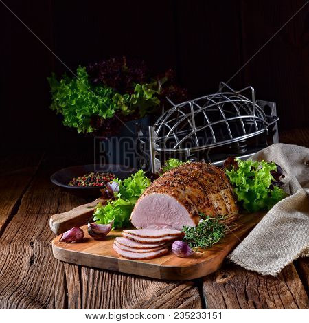 A Fresh And Tasty Cooked Ham With Colorful Pfefer