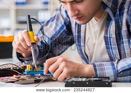 Computer hardware repair and fixing concept by experienced techn