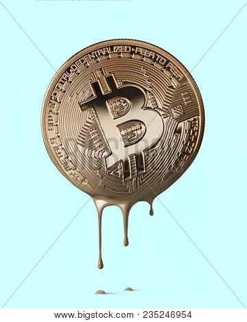physical bitcoin melting on a blue background