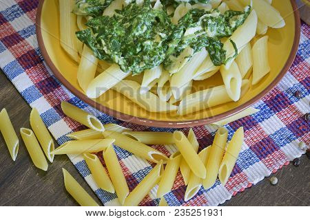 Homemade Cuisine Made With Pasta Covered With Spinac Creamy Sauce