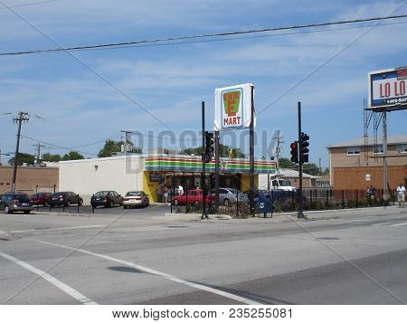 Exterior Of A Seven Eleven Turned Into A Kwik E Mart To Promote The Simpsons Movie, Chicago, Il July