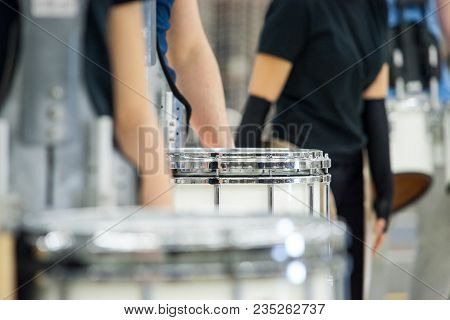 Details From A Music, Show And Marching Band. Playing Musicians With Percussion Instruments During A