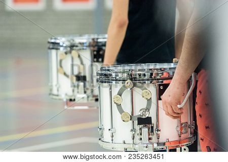 Details From A Music, Show And Marching Band. Playing Musicians With Percussion Instruments During A