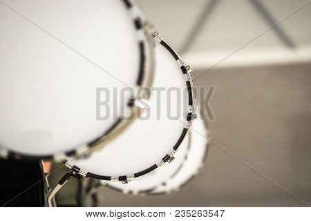Musicians March, Play And Make Music With Large Bass Drums