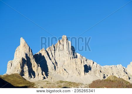 Peaks in Lescun Cirque. On the left Petite Aiguille Ansabere and to the right Grand Aiguille Ansabere. Aspe Valley, Pyrenees, France.