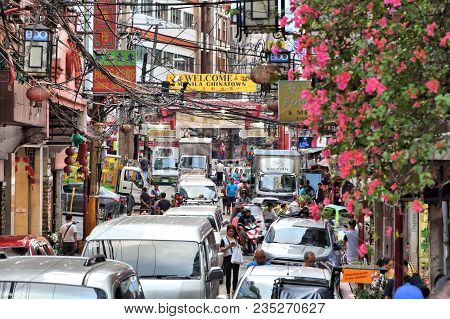 Manila, Philippines - November 25, 2017: People Visit Chinatown In Manila, Philippines. Metro Manila
