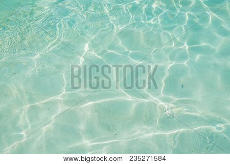 Top View Of Reflection Light On Water At Sandy Beach,summer Background