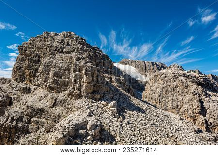 Mountain Glacier Ending With A Sheer Drop. Brenta Dolomites, Italy.