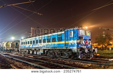 Locomotive With A Freight Train At Agra Cantonment Railway Station. Uttar Pradesh State Of India