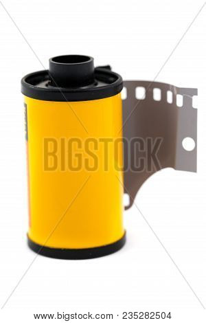 Expired 35mm Film Against An Isolated White Background In Studio.