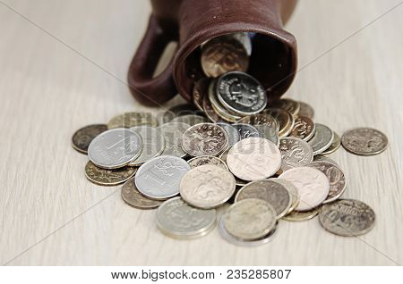 Ancient Jug With Coins. Old Coins In A Pot. Savings