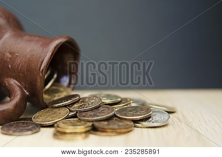 Ancient Jug With Coins. Old Coins In A Pot. Savings