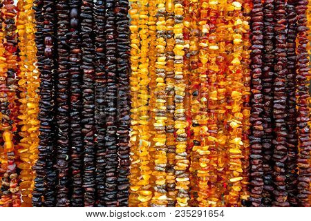 Succinite. Amber necklace. Amber of different colors and sizes.