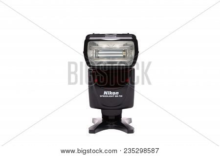 Kyiv, Ukraine - February 28, 2015: Photo Camera Flash Nikon Speedlight Sb-700 On White Background