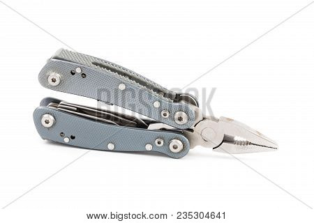 Fly Fishing Multi Tool Against A White Isolated Background Shot In Studio.