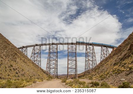 Polvorilla, Argentina - November 14, 2015: A Train Driving Over The Polvorilla Viaduct In The Northw