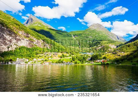Geiranger Is A Small Tourist Village In Sunnmore Region Of Norway. Geiranger Lies At The Geirangerfj