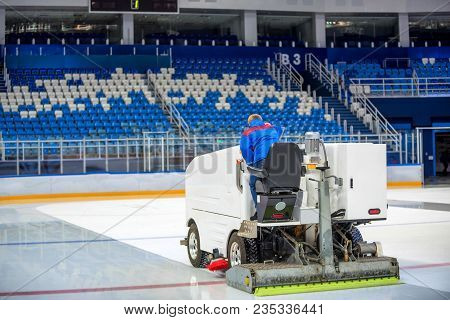 Resurfacing Machine Cleaning Ice Of Hockey Rink
