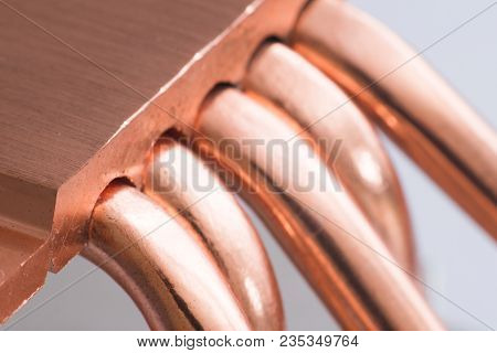 Aluminum Radiator With Copper Heat Pipe Close-up With Beautiful Bokeh Metallic Background