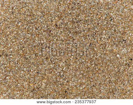 Texture Of Small Pieces Of Colorful Seashells And Little Multi-colored Pebbles