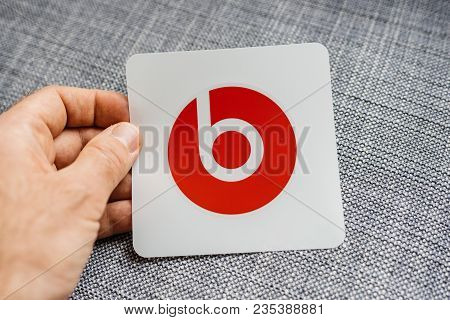 Paris, France - Mar 31, 2018: Man Unboxing New Apple Beats By Dr Dre Beats Wireless Headphones Looki