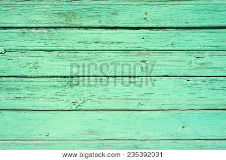 Pastel Green Stained Wood Background Texture With Horizontal Parallel Boards, Wood Grain And Copy Sp