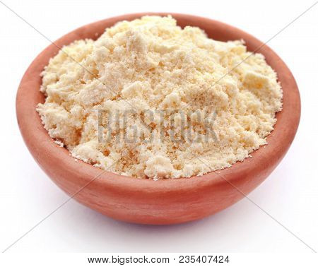 Gram Flour In Bowl Over White Background