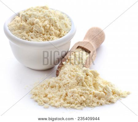 Closeup Of Gram Flour Closeup Over White Background