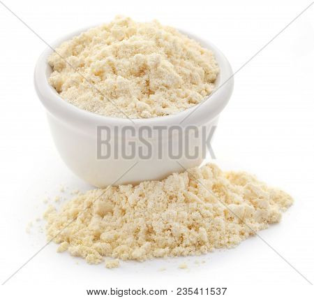 Closeup Of Gram Flour Closeup Over White Background
