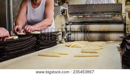 Preparing And Weighing Dough In A Large Bakery.